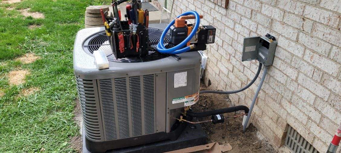 McDaniel Heating Cooling and Plumbing service vehicle and equipment